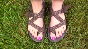 Sandal feet in grass